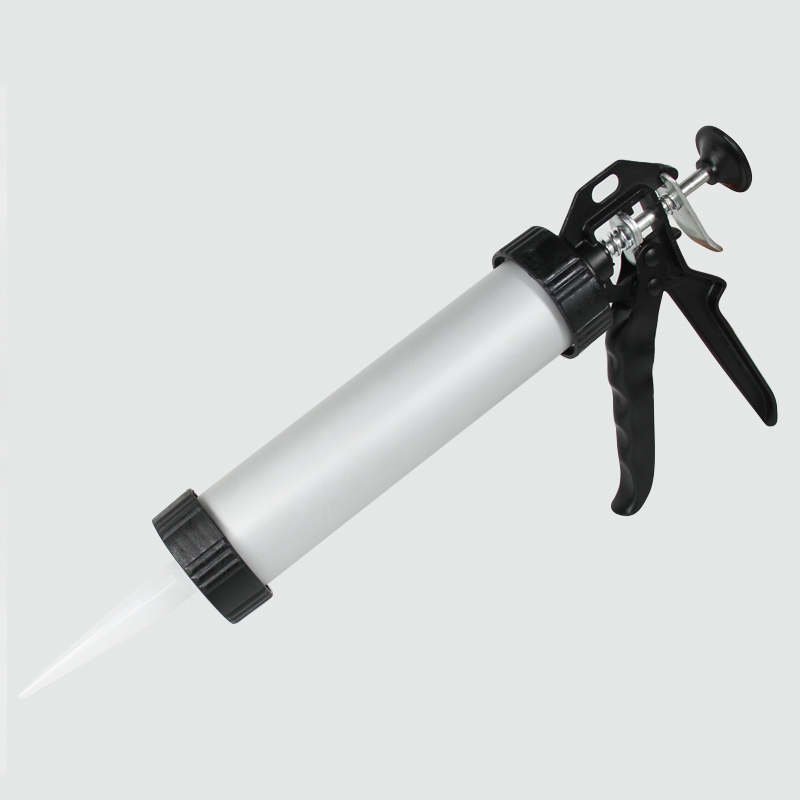 Manual caulking gun