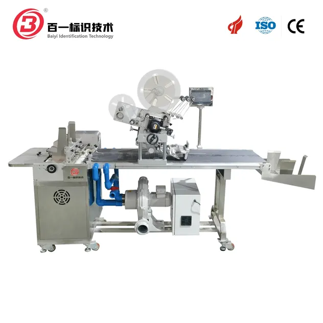 Feeding and labeling machine