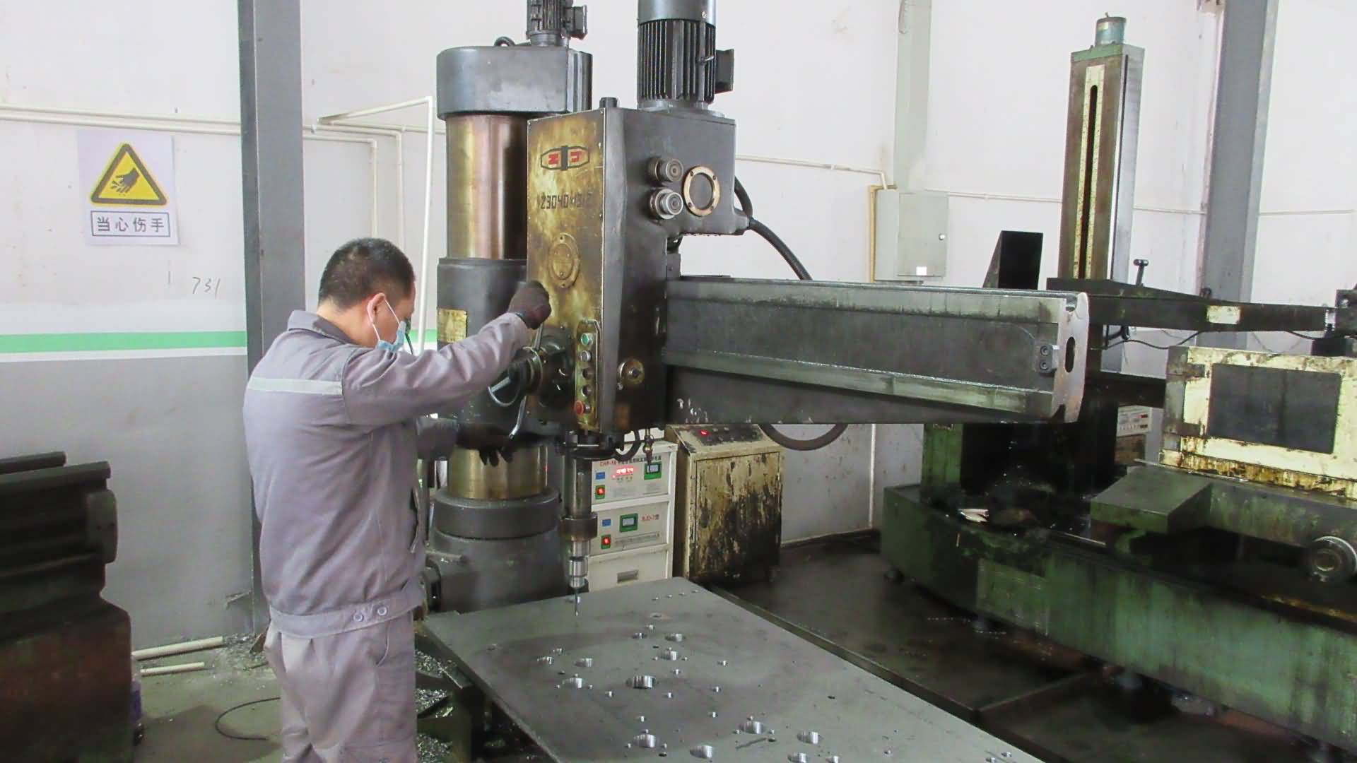 CNC precision drilling process for label printing machine components