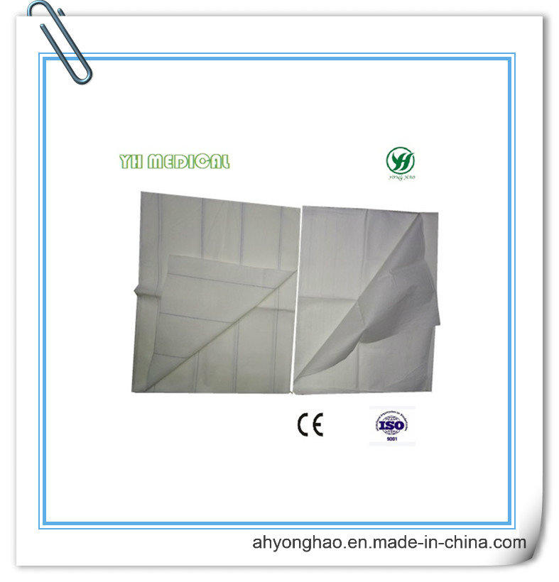 Lençol descartável de papel e plástico