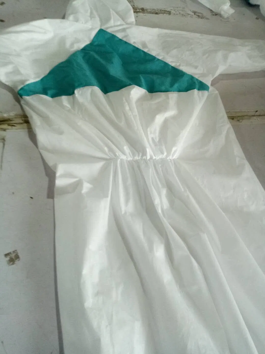 Ce FDA Safety Disposable Protection Clothing Coverall Protective Clothing Waterproof Isolation Clothing Overalls Suit Chemical Resistant Suit