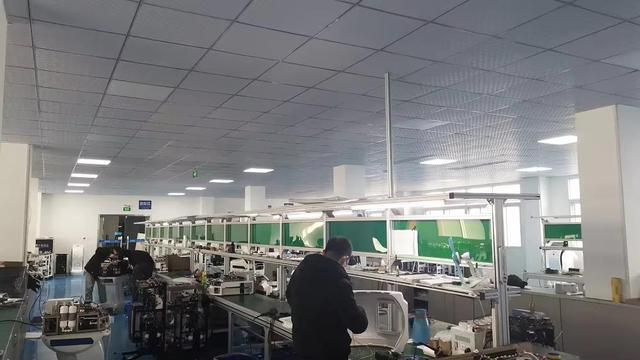 Medical aesthetic equipment manufacturing workshop at Derma Laser Shenzhen