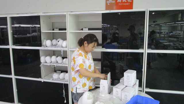 Shenzhen Derma Laser Co. Ltd. manufacturing facility interior showing advanced aesthetic equipment production
