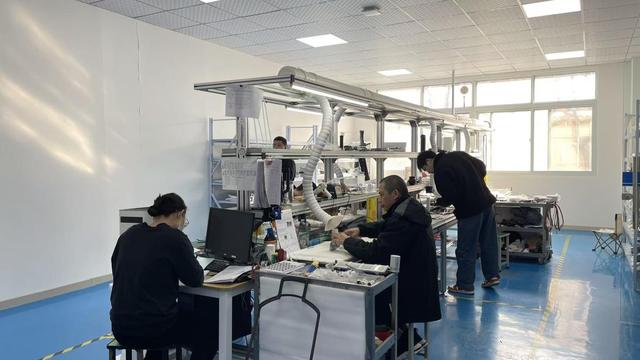 Aesthetic laser device assembly and testing production line