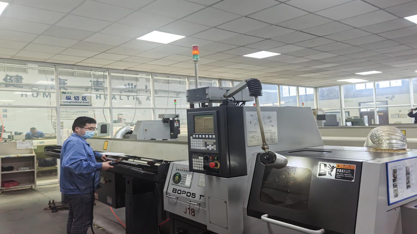CNC cutting machine for titanium alloy spinal implant fabrication