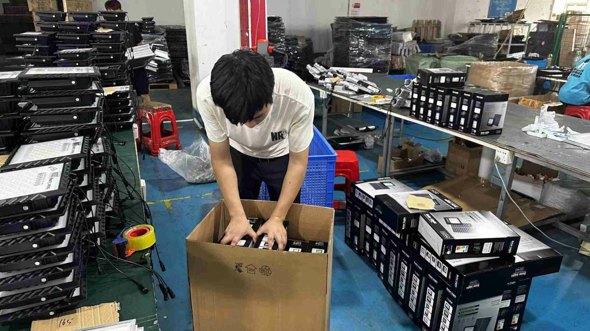 Final packing and packaging of LED lighting products at Merak