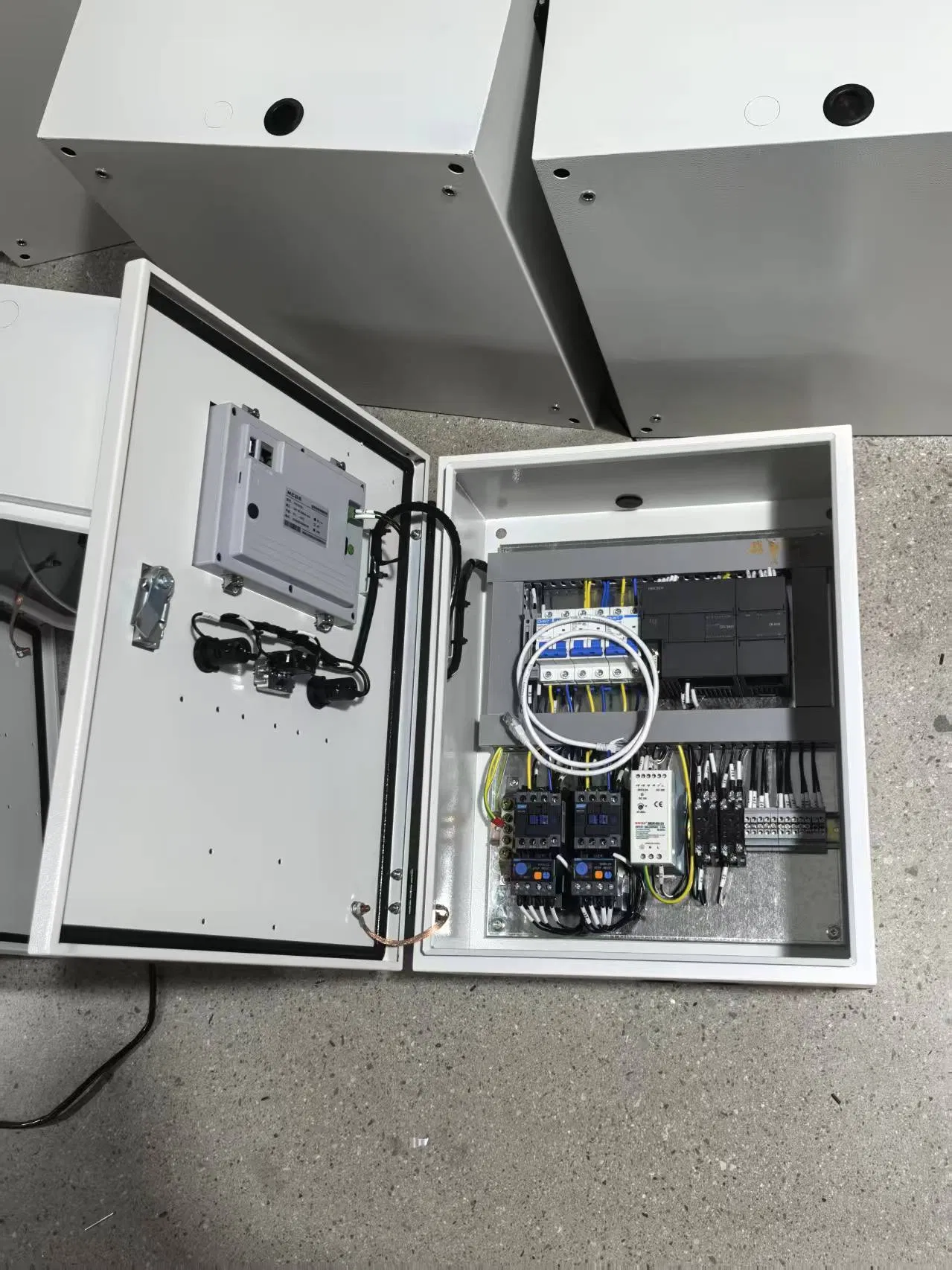Industrial PLC Control Panel Box with HMI Touchscreen and Emergency Stop Button for Automation Systems
