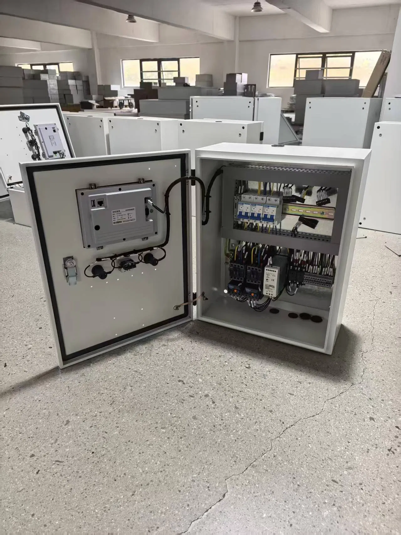 Industrial PLC Control Panel Box with HMI Touchscreen and Emergency Stop Button for Automation Systems