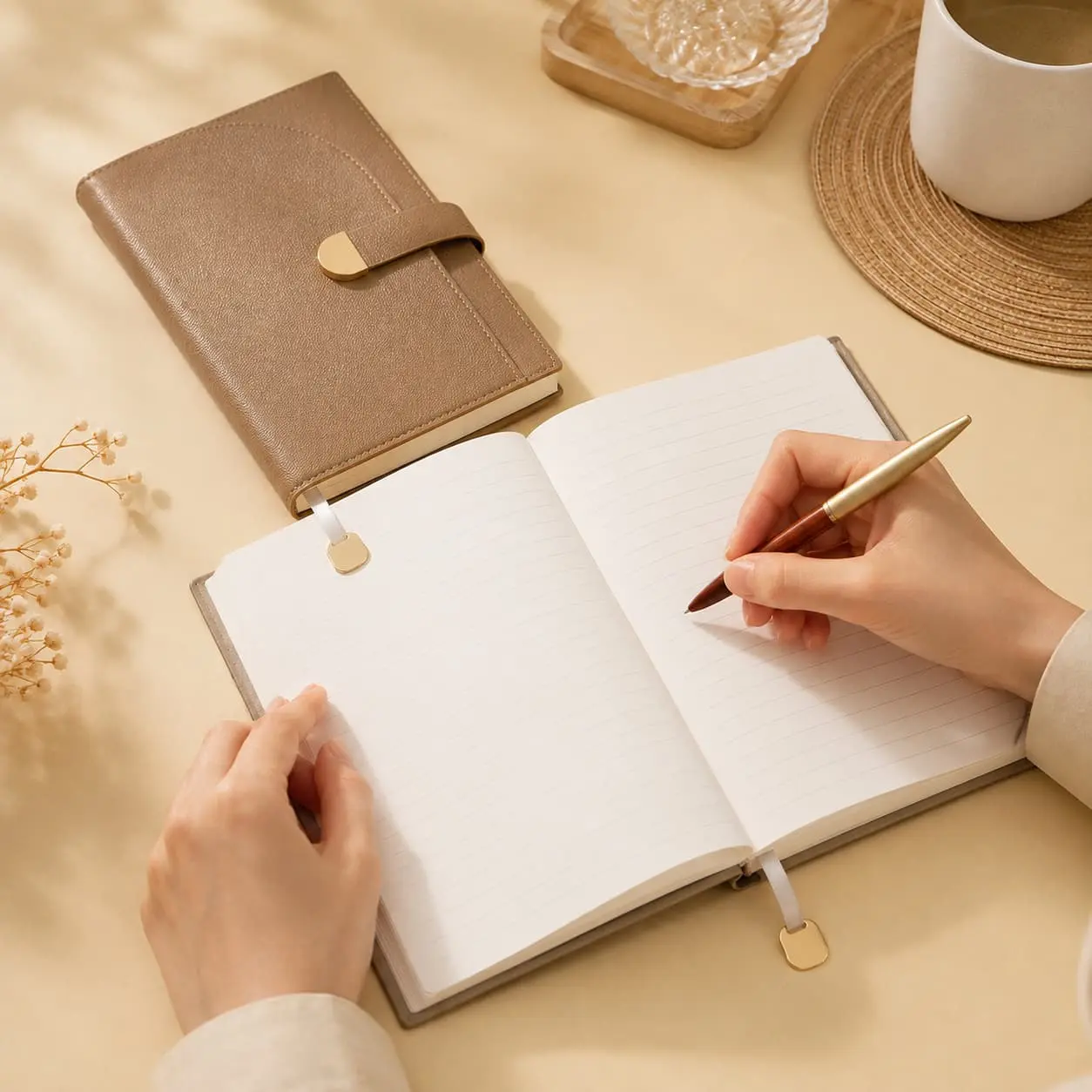 China Custom A5 Pebble PU Strap Closure Hardcover Notebook | 100gsm Lined Journal Manufacturer, Supplier