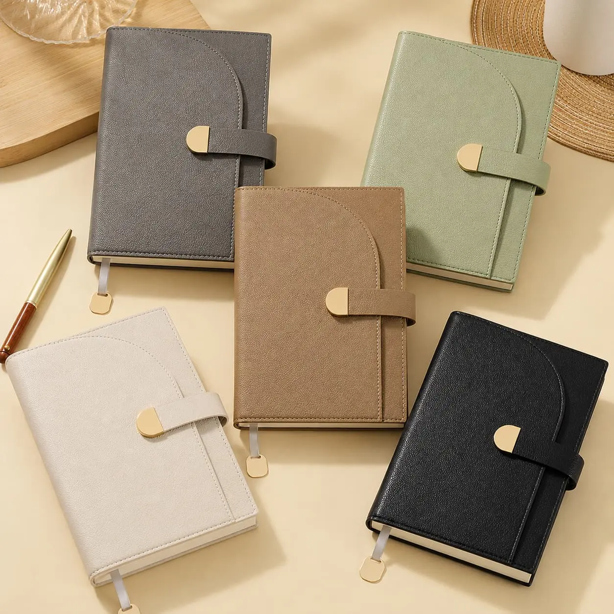 China Custom A5 Pebble PU Strap Closure Hardcover Notebook | 100gsm Lined Journal Manufacturer, Supplier