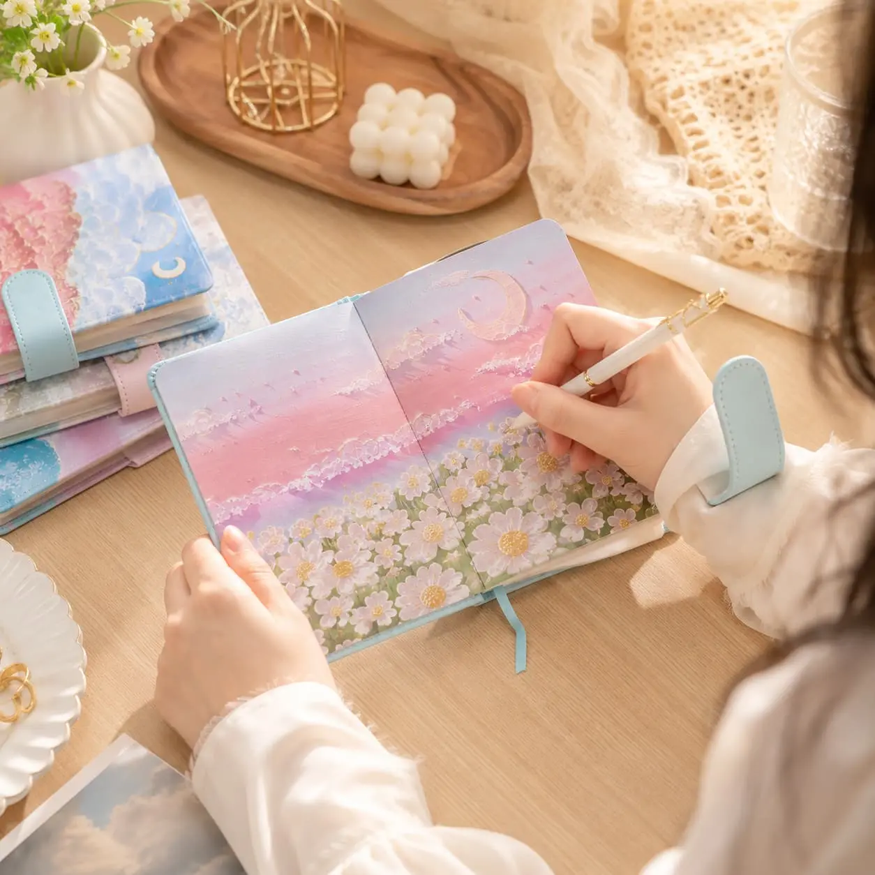 China Custom 128 × 180 mm Dreamy Art Cover Strap Closure Notebook | 100gsm Paper Supplier, Suppliers