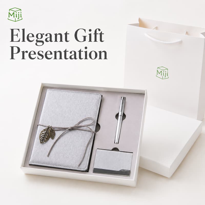 Premium silver notebook pen and card holder gift set presented with matching packaging