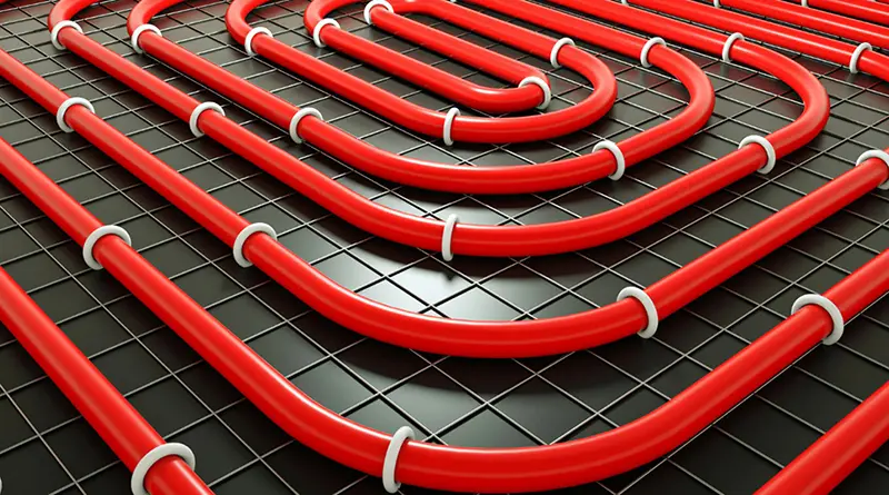 Underfloor heating system installation using Minde plastic pipes and fittings