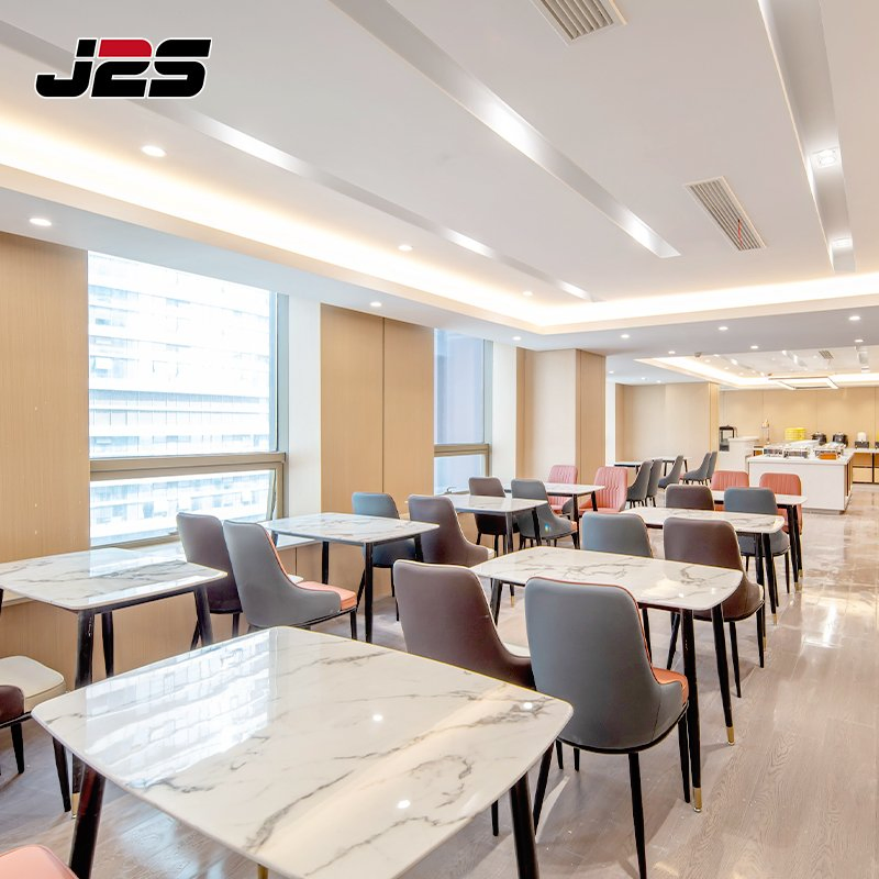 Premium Commercial Restaurant Furniture Grey Orange Seat Rectangular Stone Table Brass Foot Accent Upscale Cafe Room