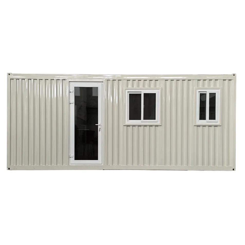 Casa contenedor segura con baño, cama y mesa de comedor
