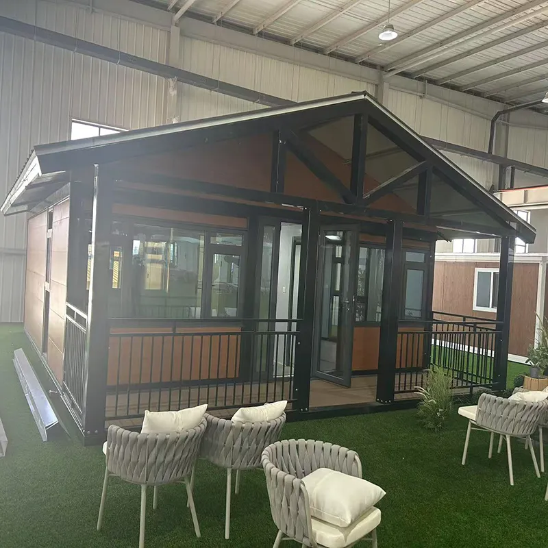Casa cápsula espacial moderna y hogar prefabricado de contenedor con interior completamente amueblado para resorts, campings escénicos y proyectos de vida modular sostenible