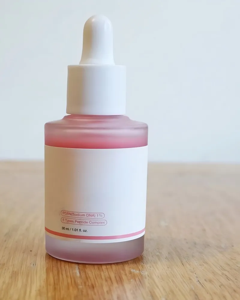 Suero facial orgánico de marca privada de granada para el cuidado de la piel, aceite facial, suero coreano