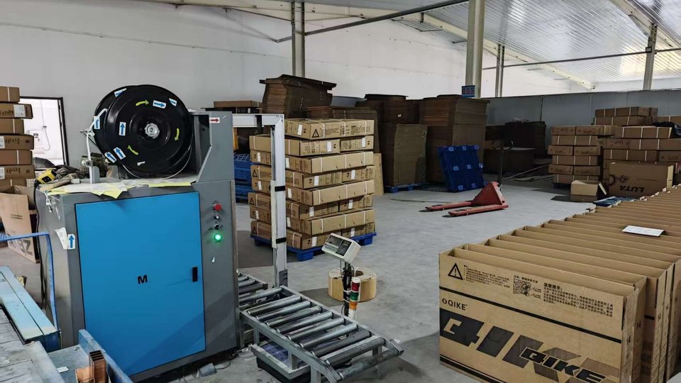 MOAD AUTO main production workshop with automated brake pad manufacturing equipment