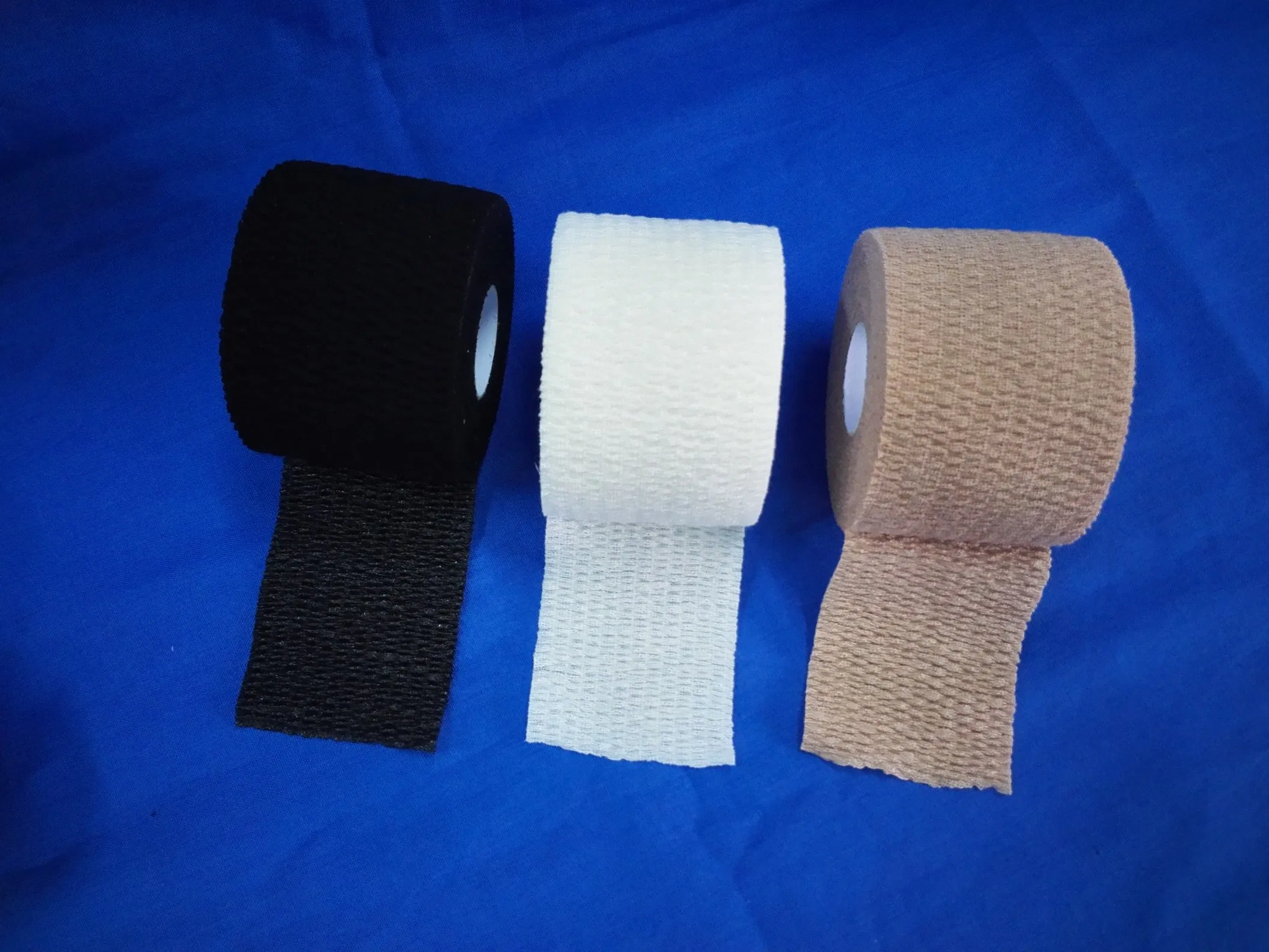 White Color Beige Color Black Color Cotton Stretch Tape Light Eab Hand Tearable Elastic Bandage Size 2.5cm/3.8cm/5cm/7.5cmx4.5m/6.9m with CE ISO FDA