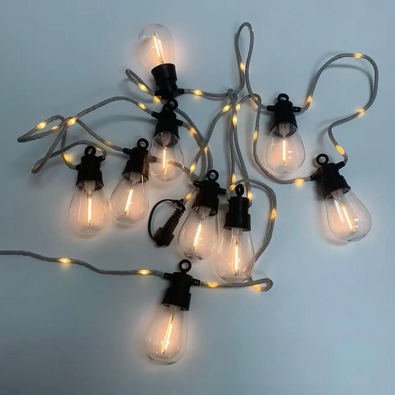 Luz de cadena solar decorativa de bombilla de filamento para patio exterior y jardín