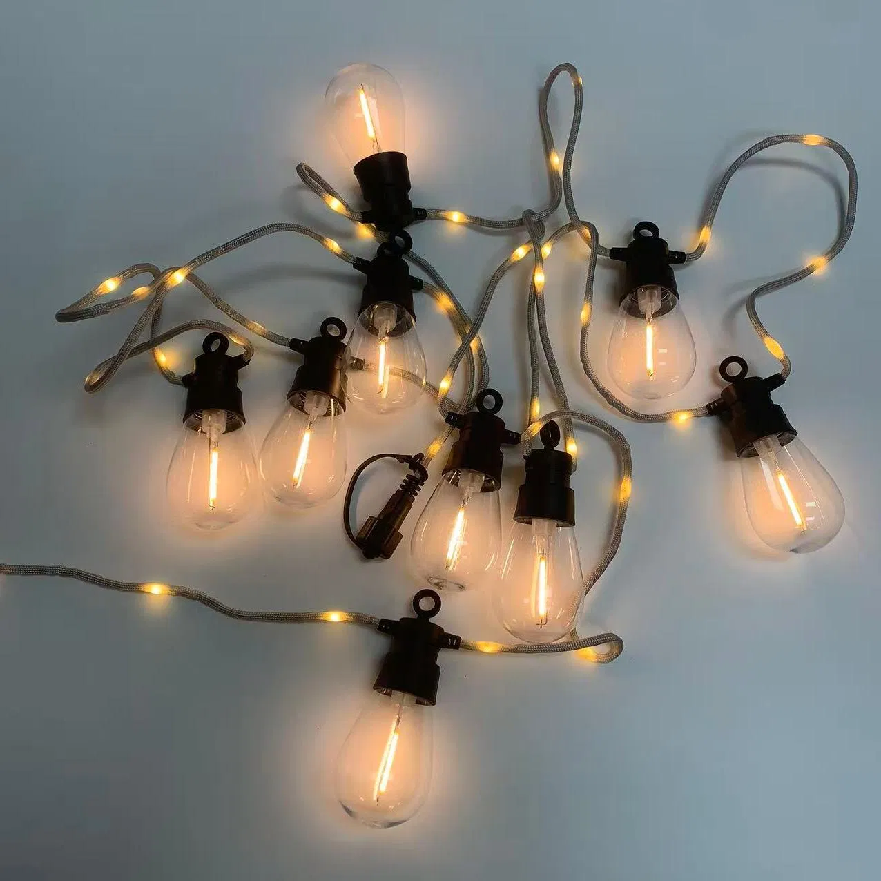 Luz de cadena solar decorativa de bombilla de filamento para patio exterior y jardín
