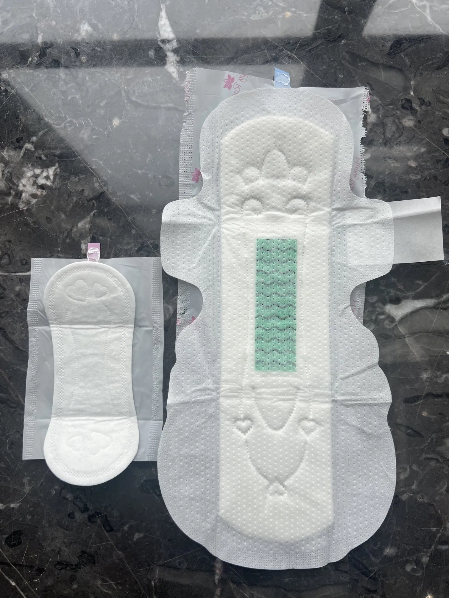 Empaques personalizados de OEM, almohadillas sanitarias super absorbentes para la noche