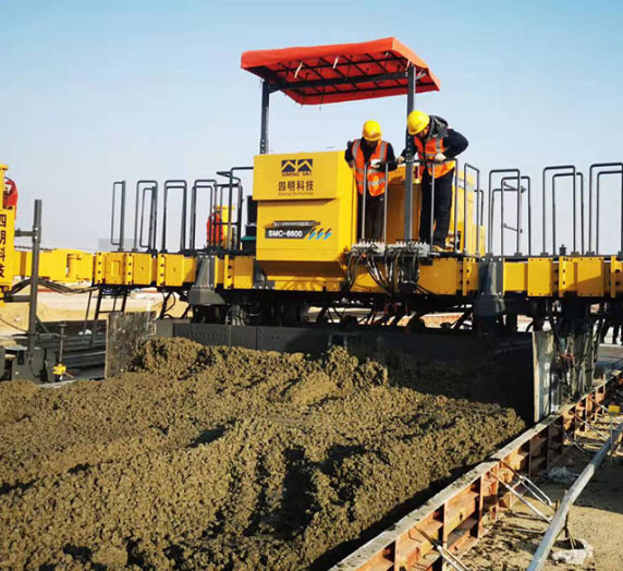 Slipform Paver Machine 177kw/2200rpmsmc-6600 6000mm Width Slslipform Chanel Paver with Core Engine Component on Sale