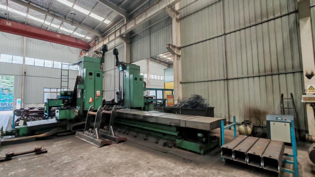 Industrial drilling machine for structural component fabrication