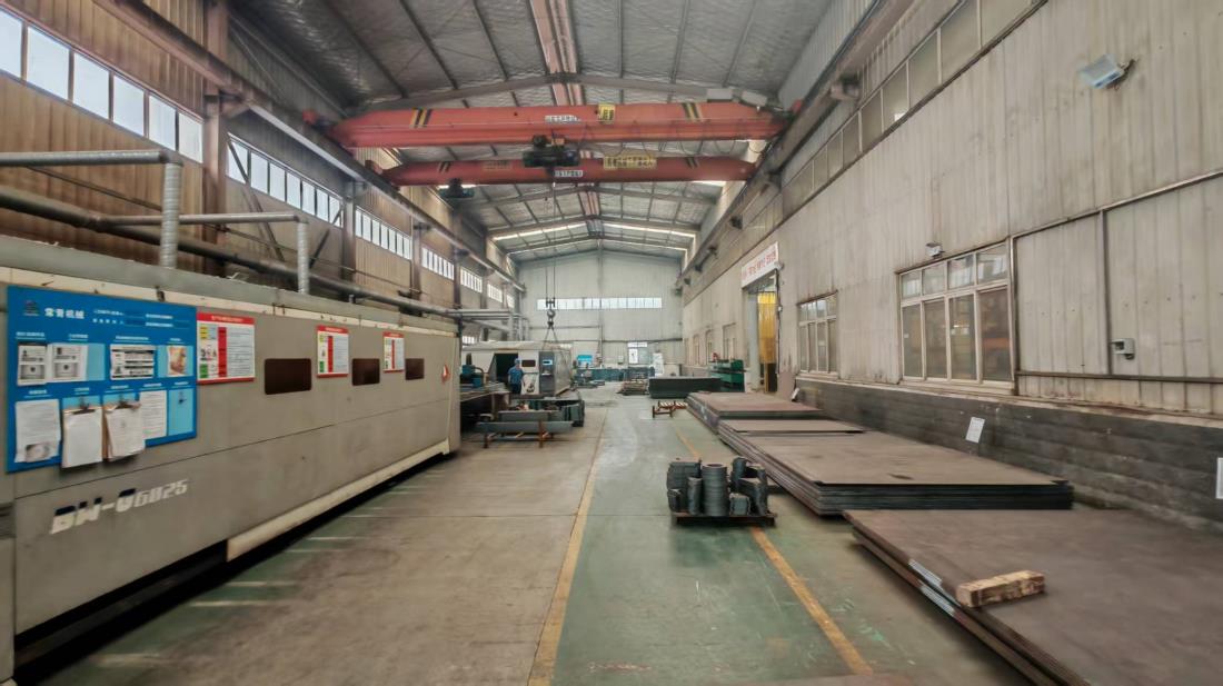 Laser cutting machine for precision steel fabrication