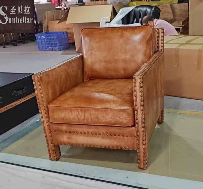 Top Grain Leather Armchair Featuring Wooden Frame and Rivet Accents