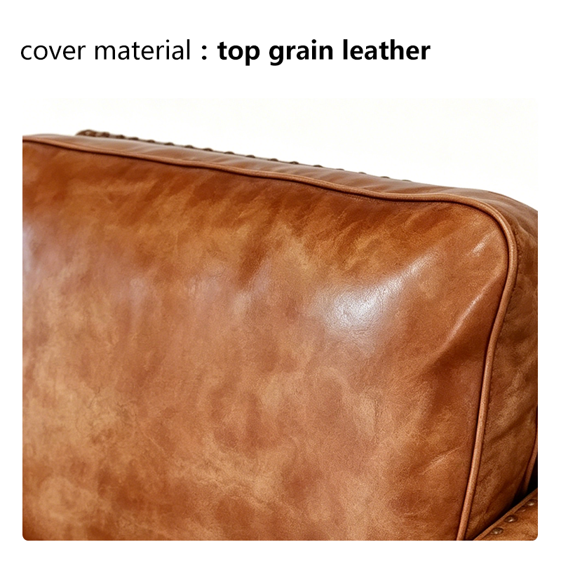 Top Grain Leather Armchair Featuring Wooden Frame and Rivet Accents