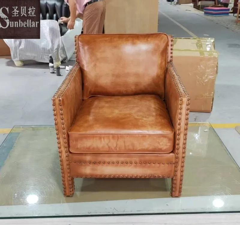Top Grain Leather Armchair Featuring Wooden Frame and Rivet Accents