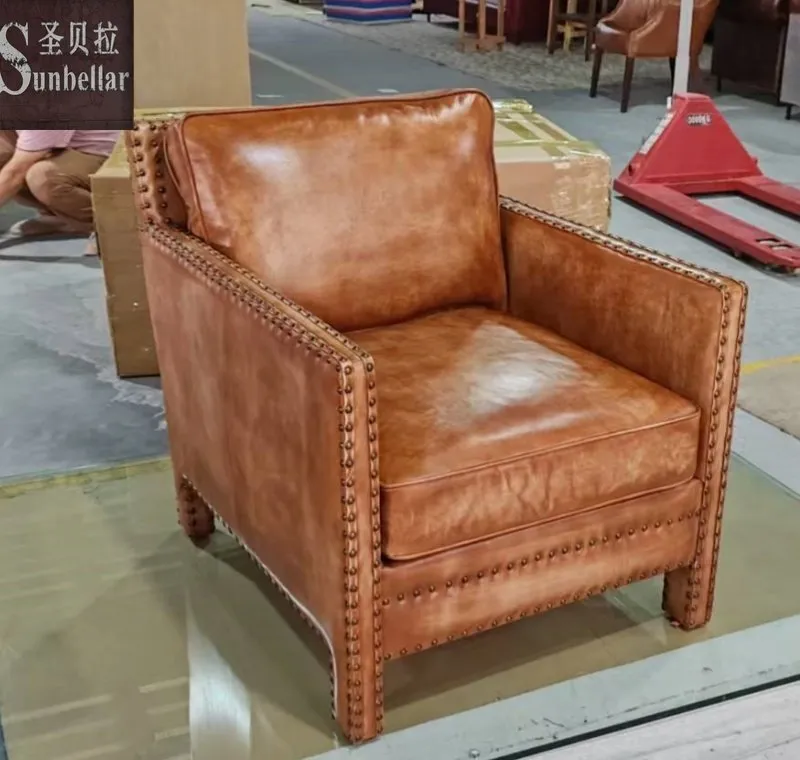 Top Grain Leather Armchair Featuring Wooden Frame and Rivet Accents