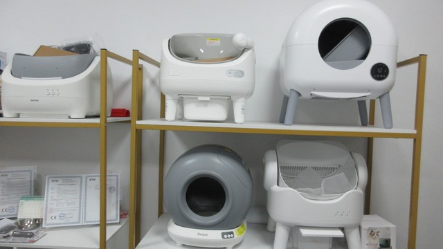 Portion control automatic pet feeder with programmable scheduling system
