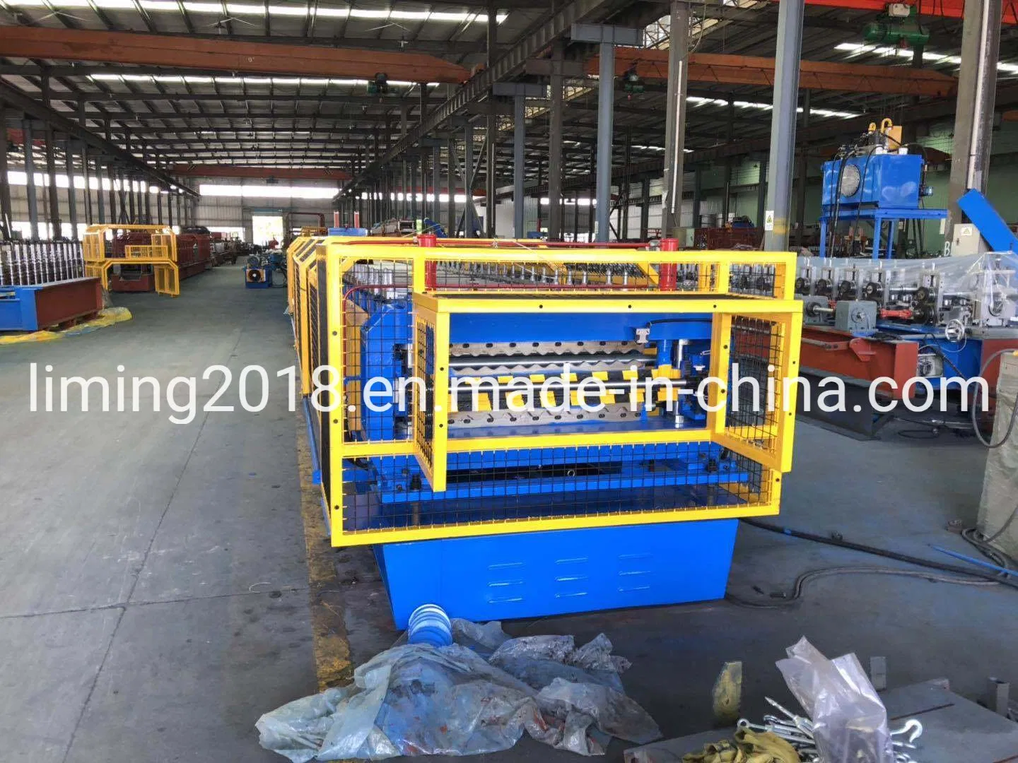 Máquina de fabricación de paneles de techo corrugado de metal IBR automático para materiales de construcción con doble capa