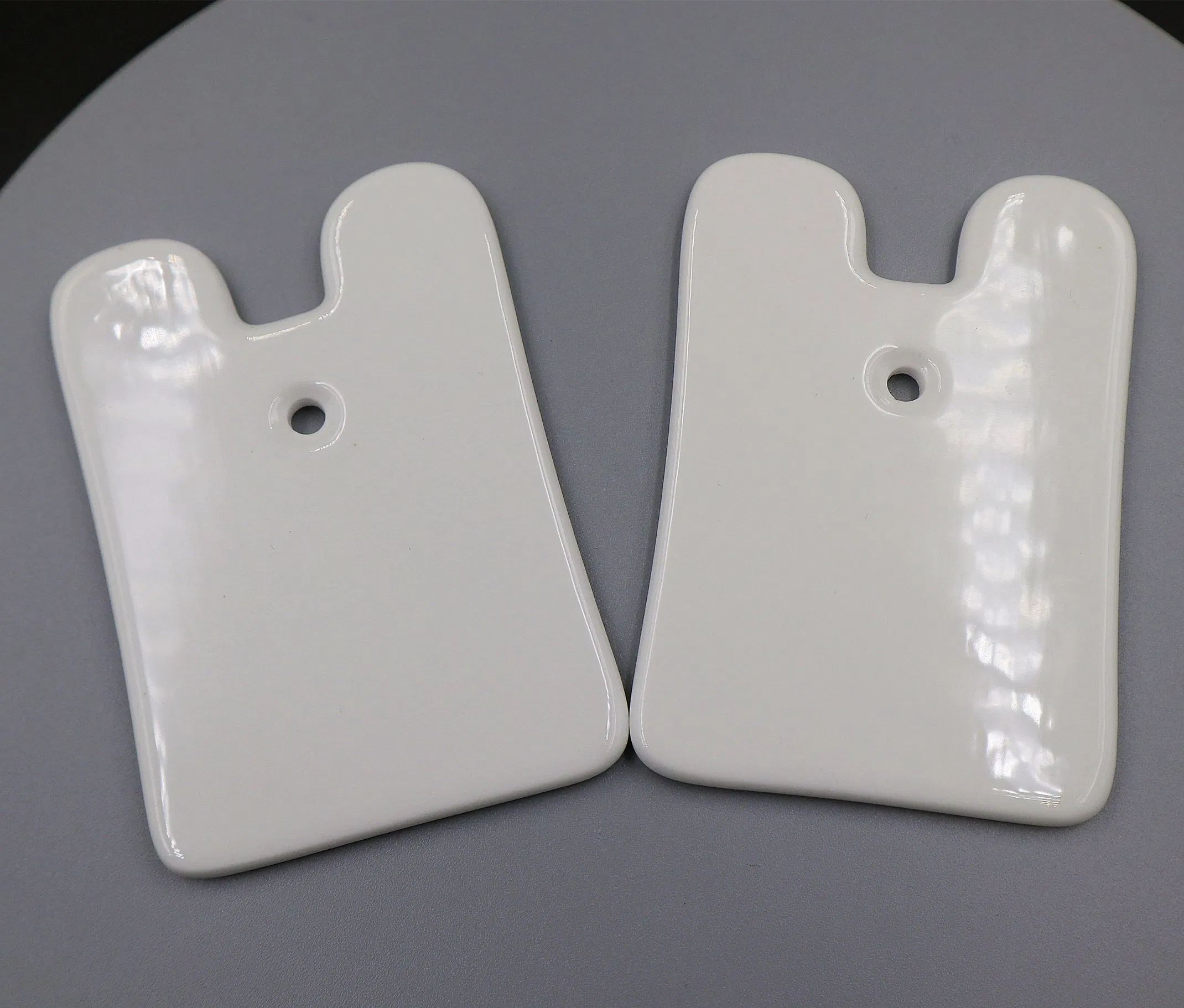 Herramienta de masaje Gua Sha de cerámica de alta calidad que promueve la circulación para el cuerpo