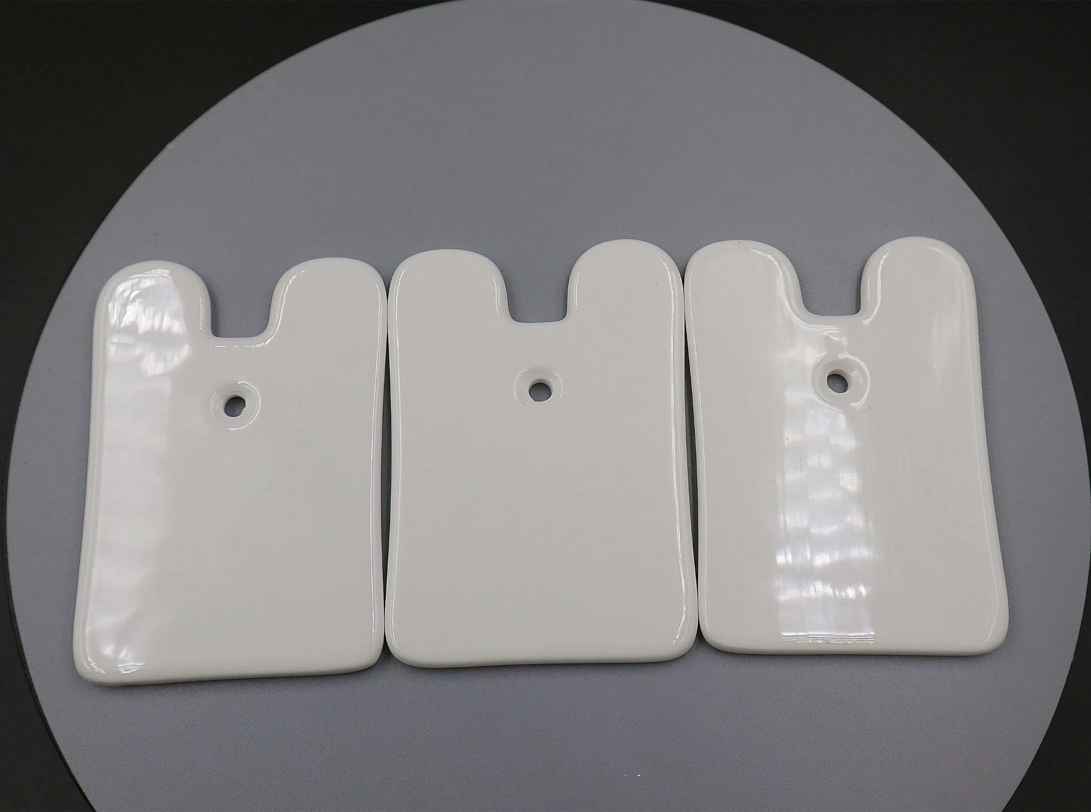 Herramienta de masaje Gua Sha de cerámica de alta calidad que promueve la circulación para el cuerpo