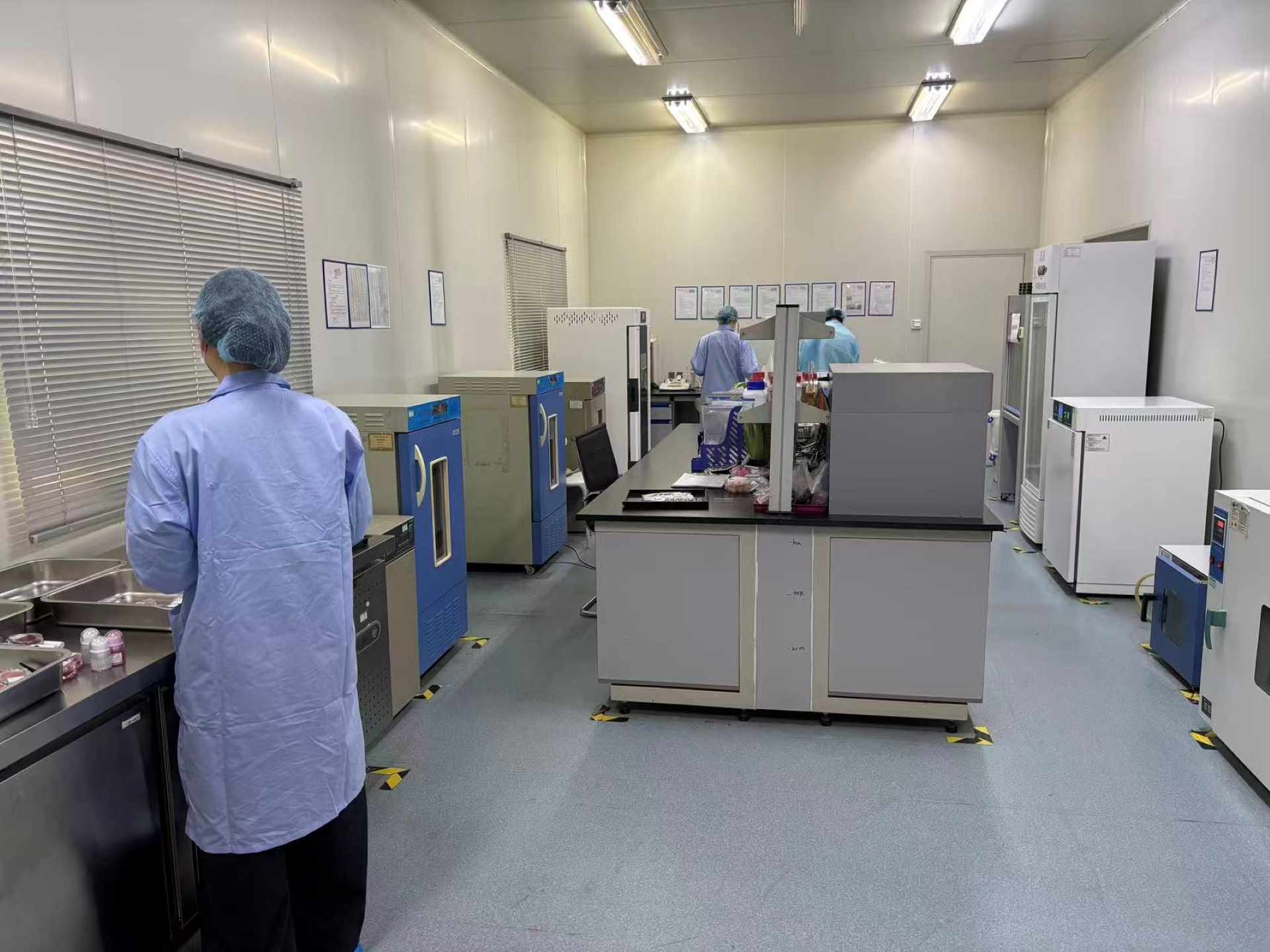 Quality inspection team checking cosmetic products at Nebula Beauty