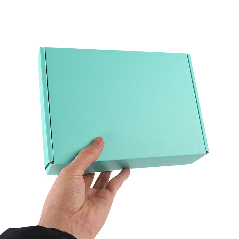 Wholesale Hard Blue Cardboard Paper Mailing Apparel Box Portable Custom Logo Printed Corrugated Shipping Cosmetic Box