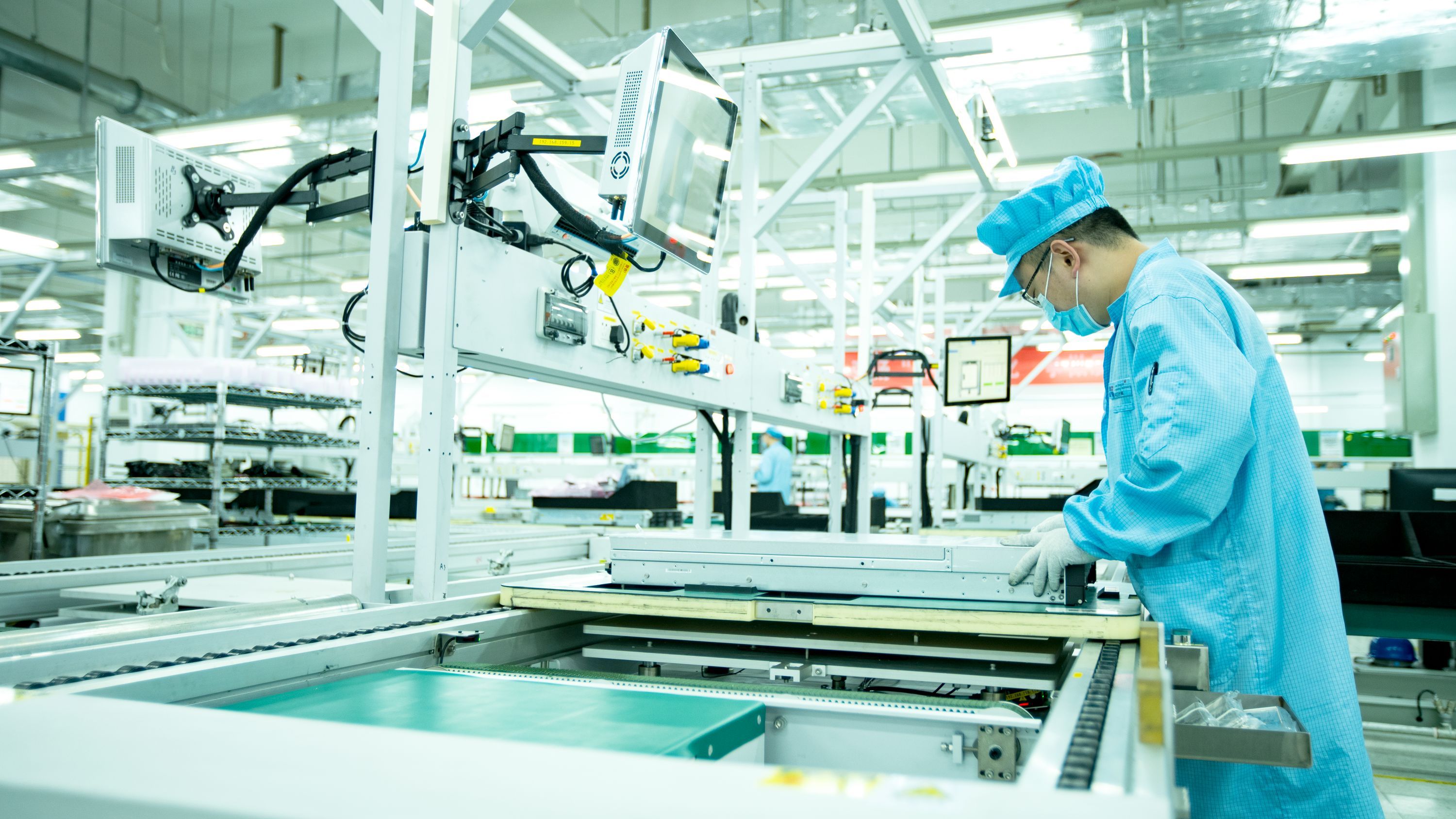 NexCore production facility — modern AI server manufacturing floor in Shenzhen