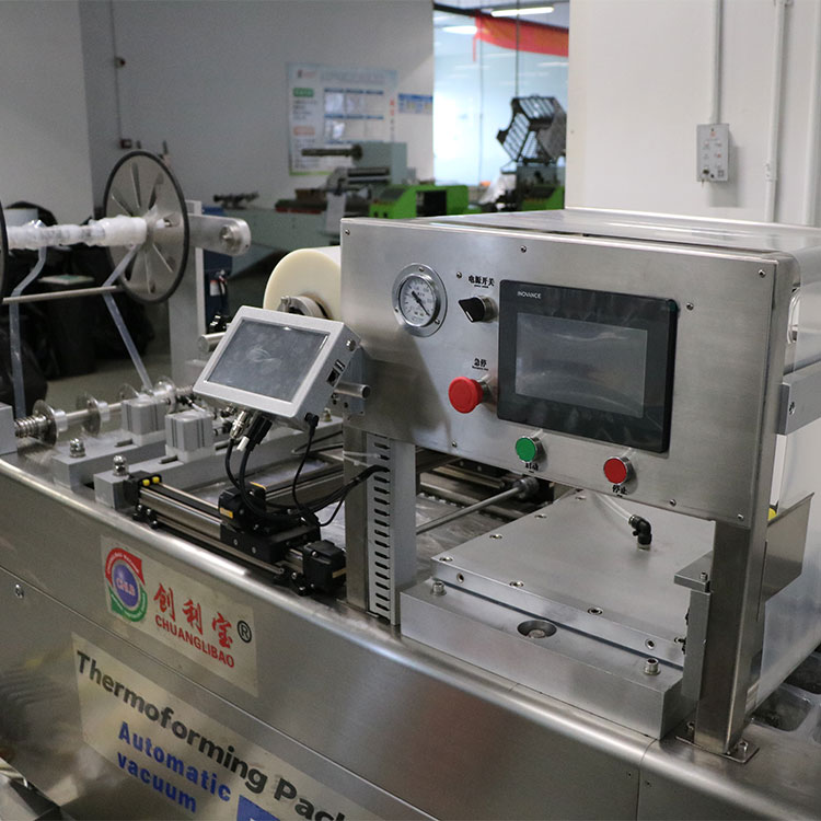 Automatic Electric Meat Pie Sausage Thermoforming Food Vacuum Packaging Machine With Stretch Film Continuous Packing