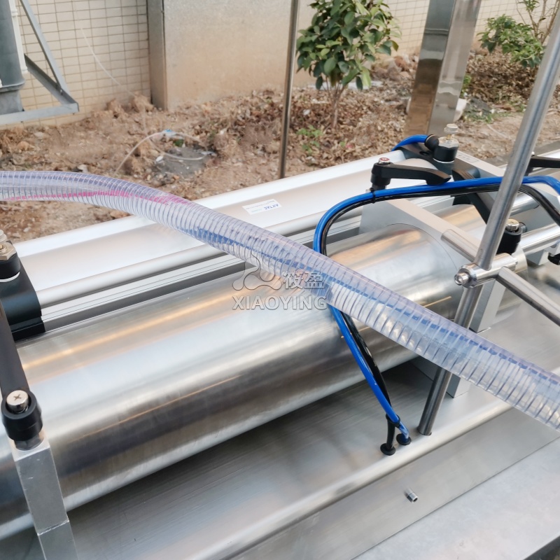 Semi Horizontal Automatic Liquid Filling Dosing Machine Full Pneumatic Driven Type Soft Drink Filling Machine For Cream Liquid