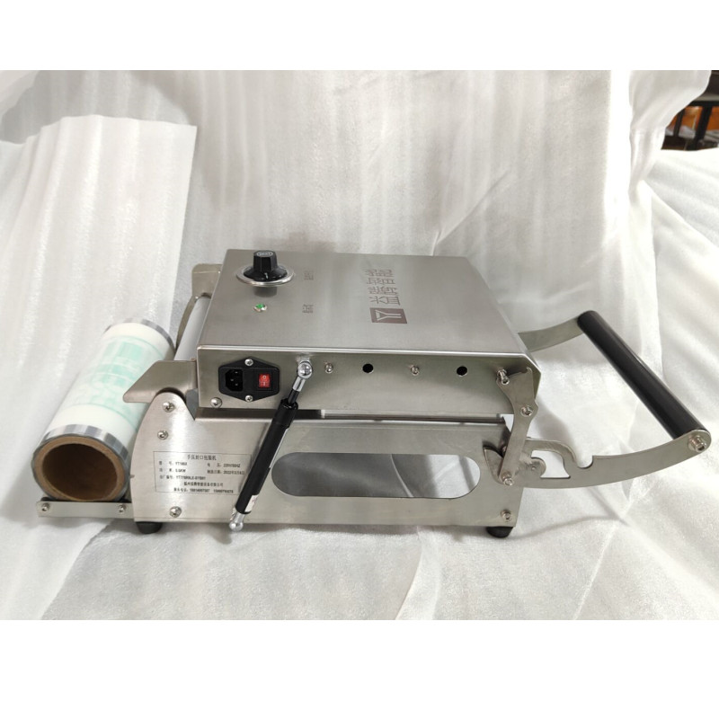 Left elevation view of manual tray sealer