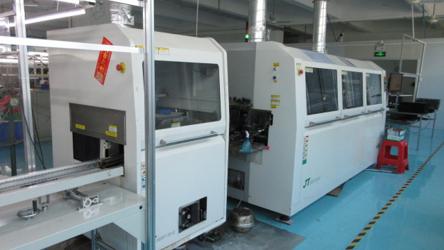 Insert device component assembly process at Nittanya Auto manufacturing facility