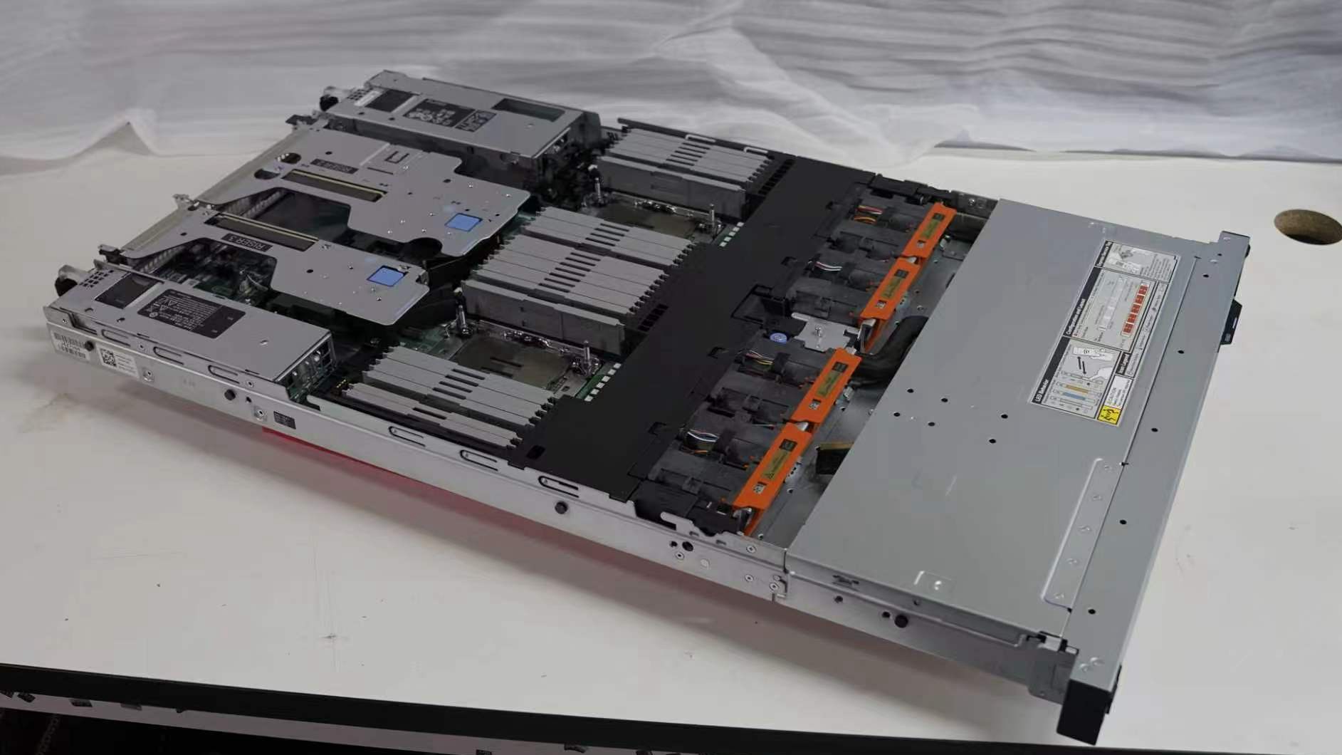 NovaAI manufacturing team performing technical inspection on GPU server board