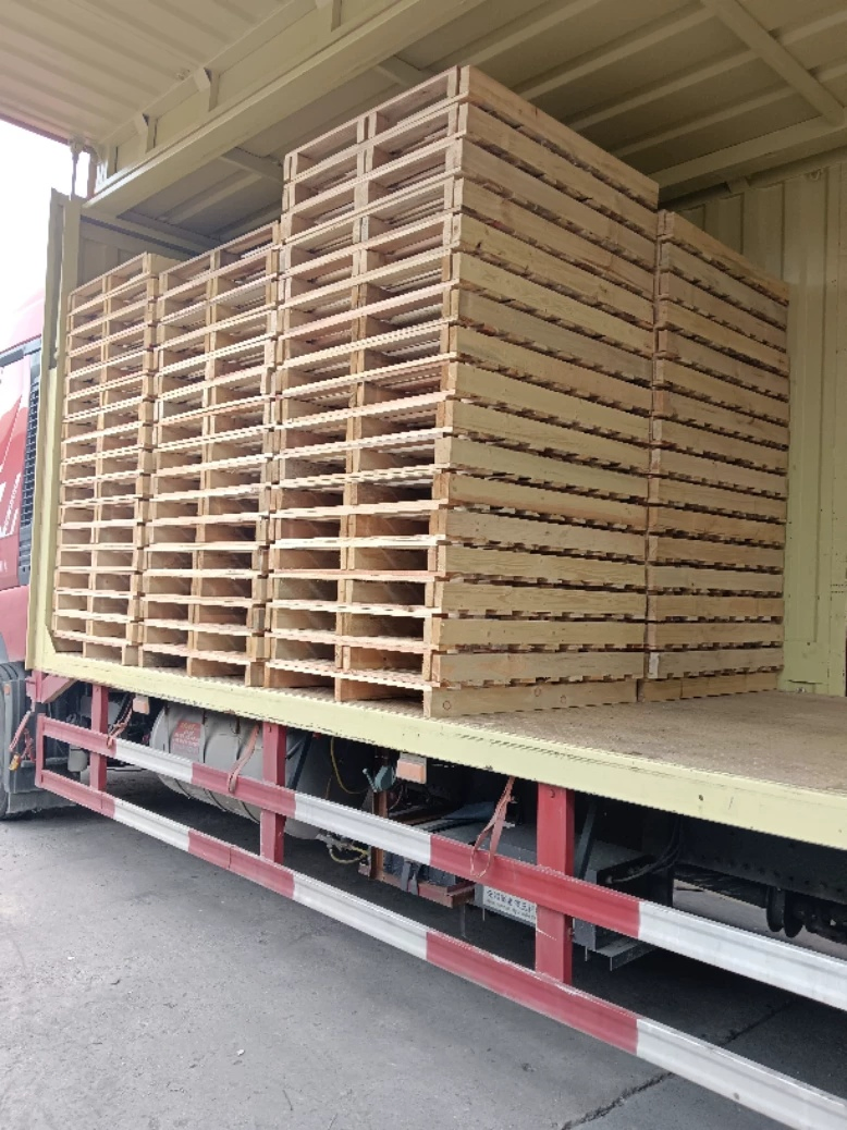 Multi-Trip Nestable Wood Pallet System for Closed-Loop Supply Chains