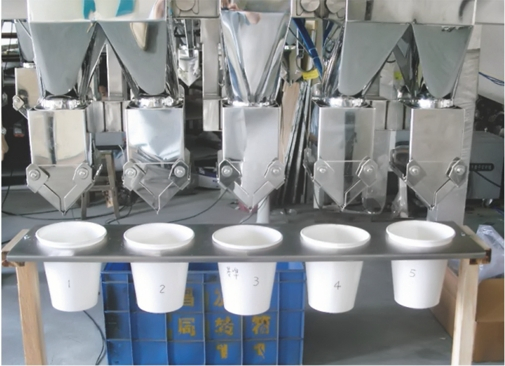 Sistema versátil de embalagem e pesagem de copo para soluções da indústria alimentar