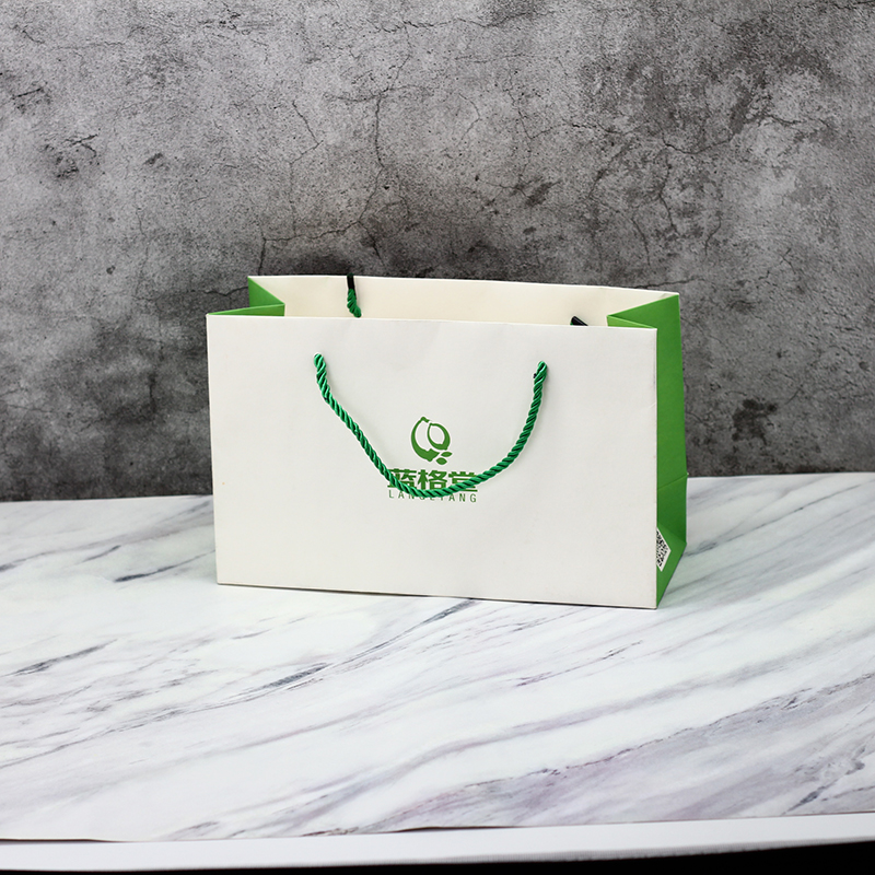 China Green logo Customized Size Printed Coated Paper Bag With Handle Manufacturers, Products