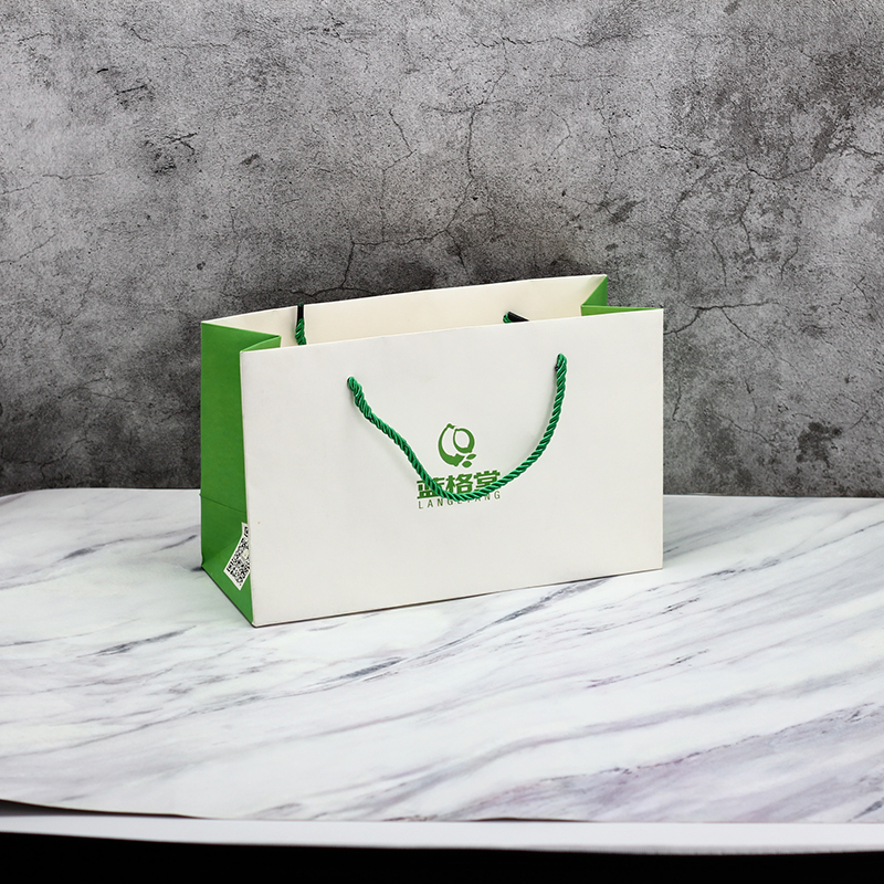 China Green logo Customized Size Printed Coated Paper Bag With Handle Manufacturers, Products