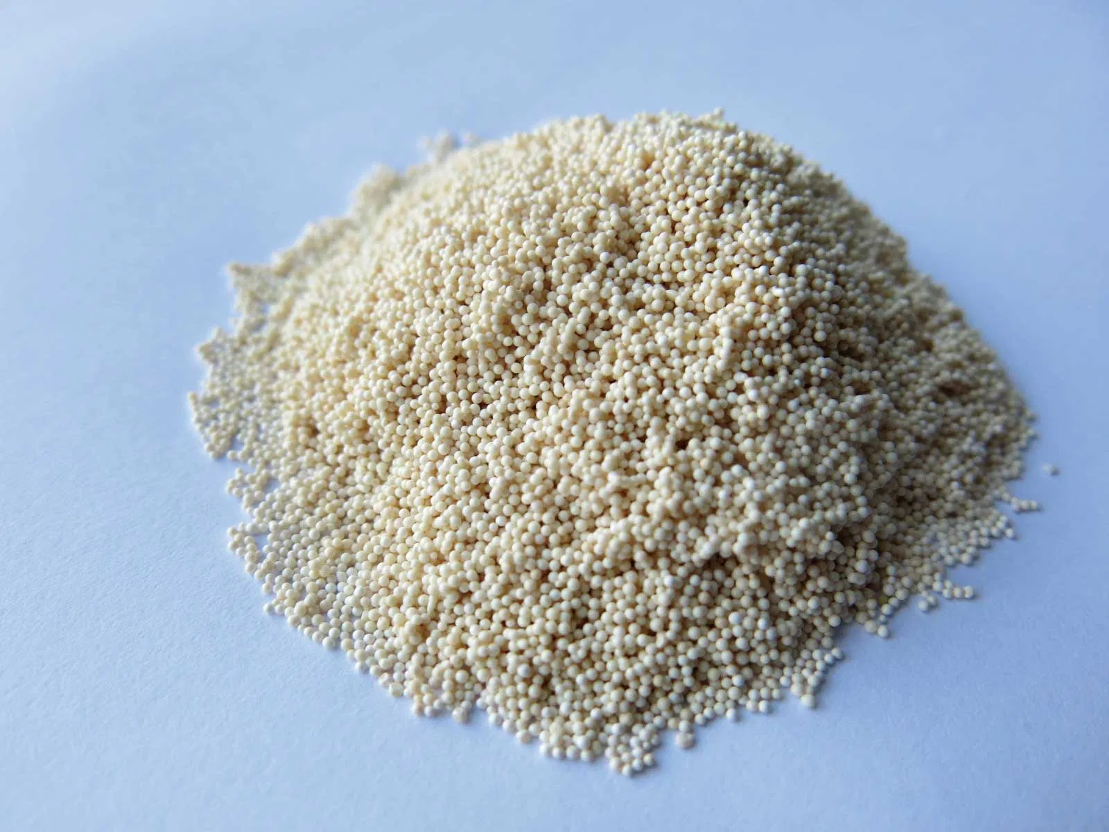 Inert Spherical Pellets as Covering Layer in Floating-Bed Countercurrent Regeneration System